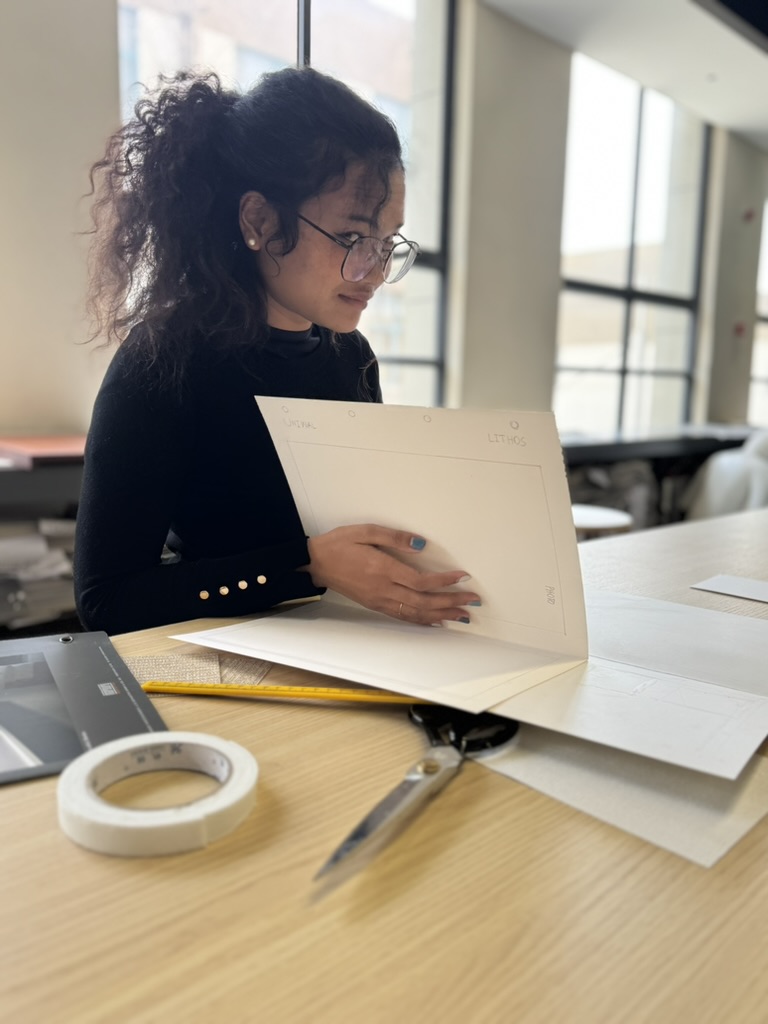 Studio team member preparing a presentation sample